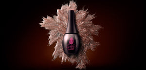 High-Grade Gel Polish ✸ Just More Beautiful ✸ Picture shows the uniquely designed gel polish bottle in front of glittery gel polish brush strokes, transmitting the characteristics of My Nice Nails' Gel Polish: strong pigmentation and powerful colors!